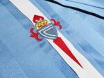 The home team color of Celta in the 2001/02 season was blue. - Image 12