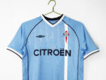 The home team color of Celta in the 2001/02 season was blue. - Image 10